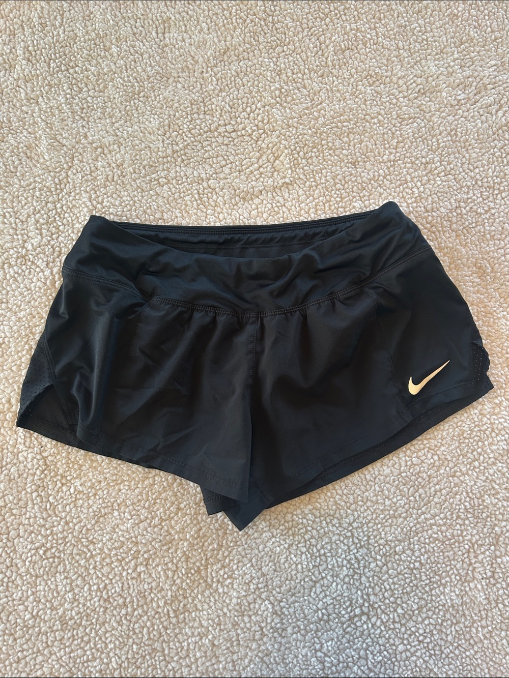 Nike Women's Black Athletic Running Shorts with Gold Swoosh